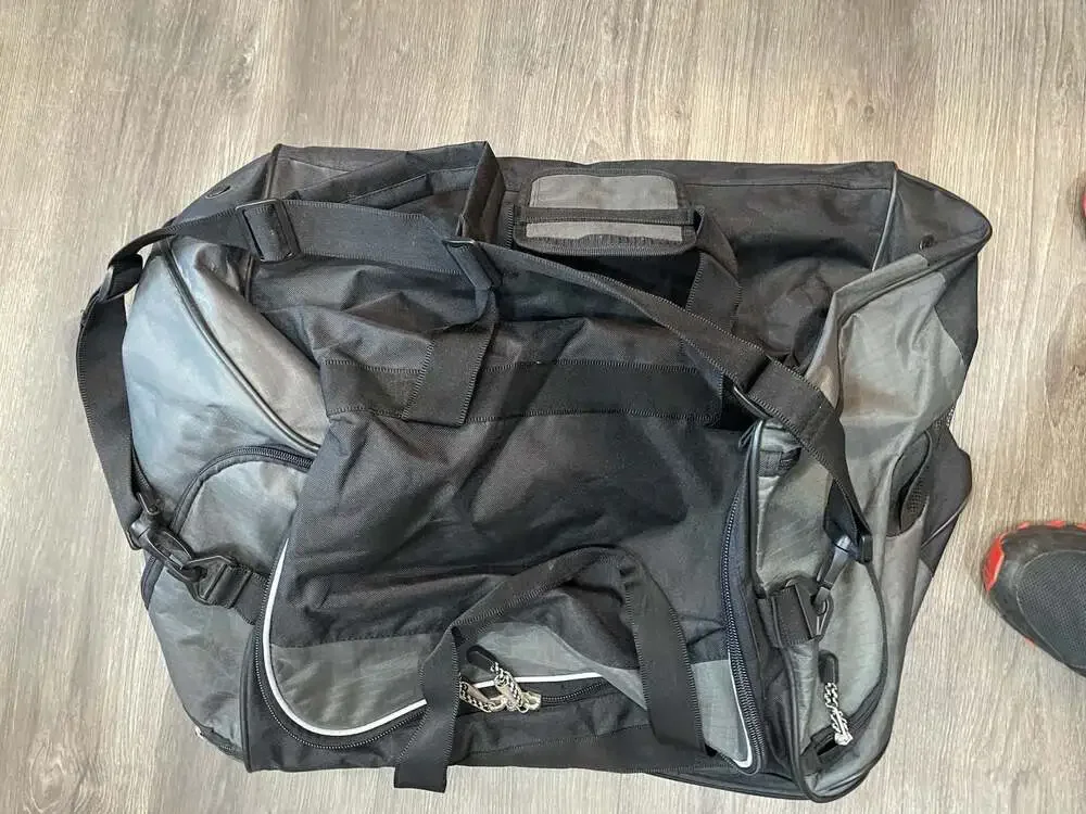 Protege Sport Large Black and Gray Heavy Duty Rolling Duffle Bag with Multiple P